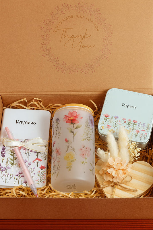 Kintoir personalized keepsake gift box featuring a floral notebook, glass tumbler, jewelry case, and wooden heart decor.