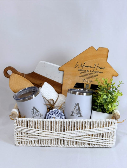 Kintoir personalized realtor closing gift basket featuring engraved wine tumblers, cutting board, and home decor items.