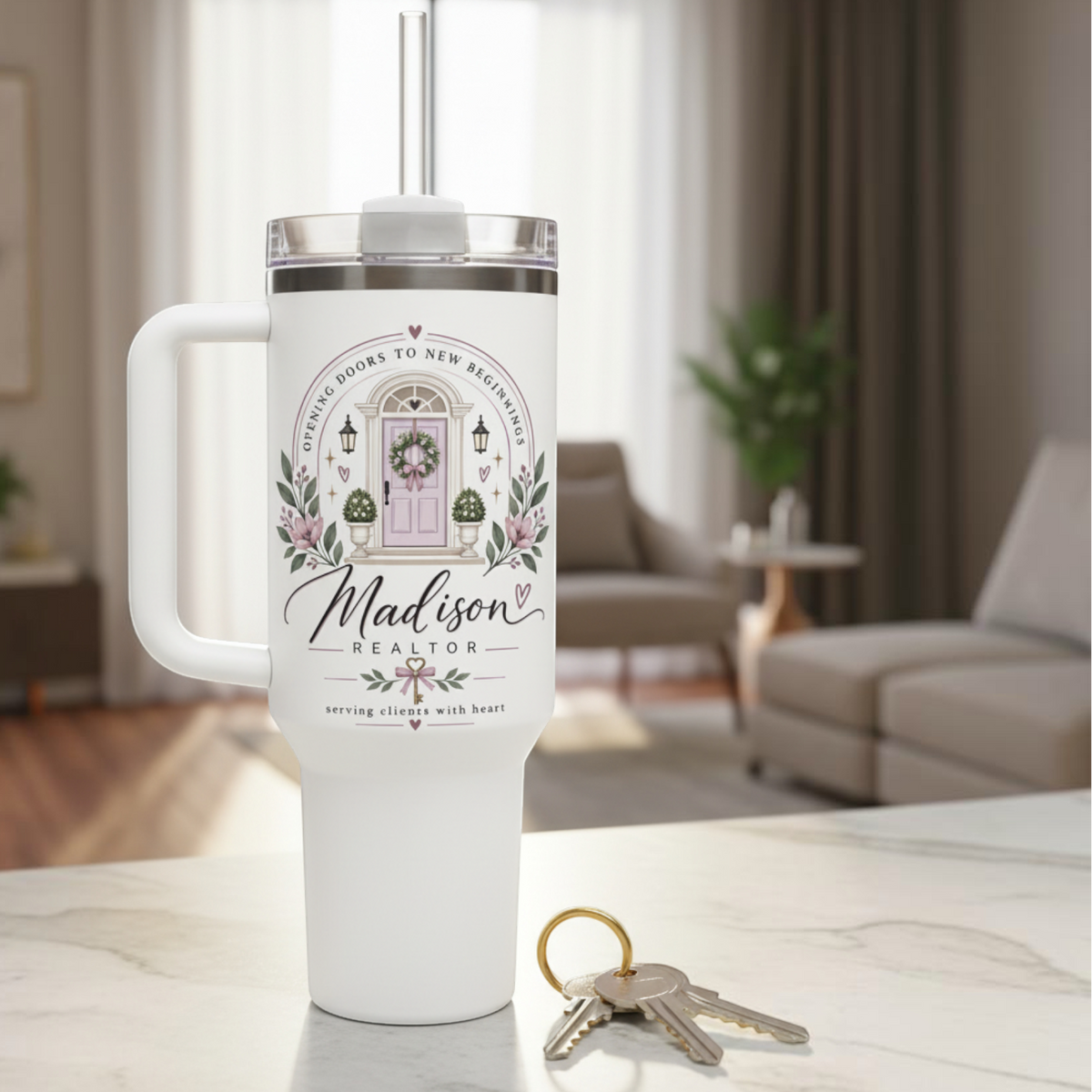 Personalized Realtor tumbler displayed beside house keys in modern home interior