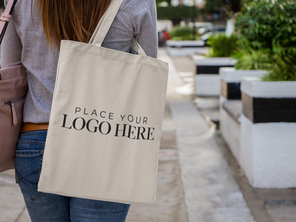 Realtor holding a custom tote bag with place your logo option