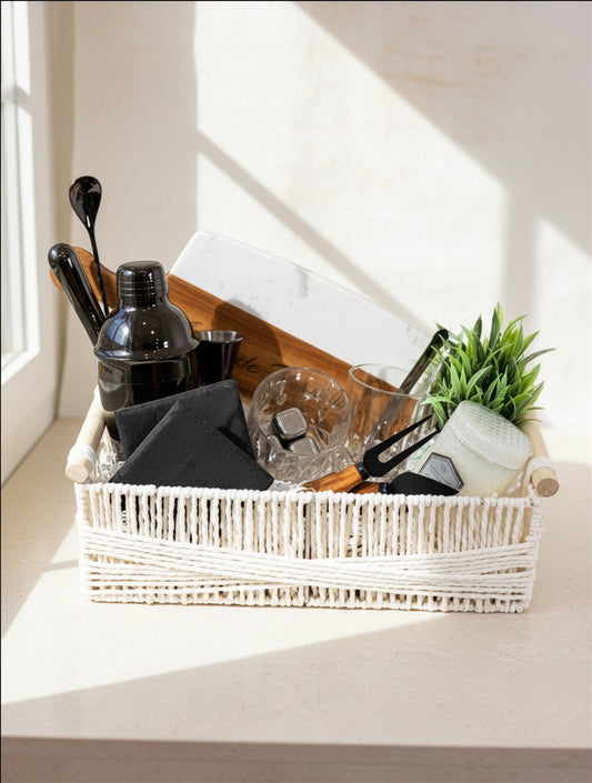 Kintoir Black Tie Entertainer cocktail gift basket featuring barware, personalized coasters, and a cutting board.