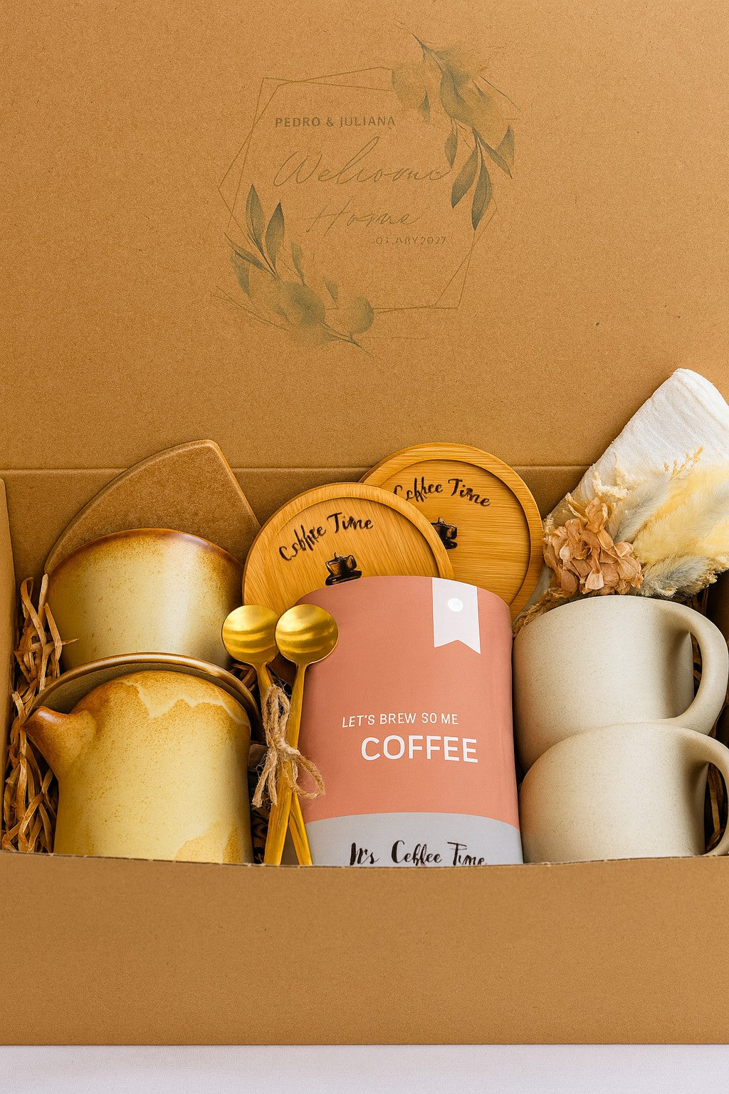 Kintoir Cozy Mornings coffee gift box featuring ceramic mugs, gold spoons, wooden coasters, and pour-over coffee maker.