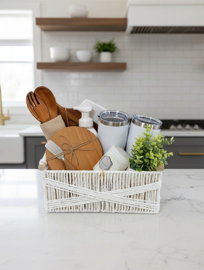 Woman holding Cozy Home Essentials ready-to-gift housewarming basket with tumblers, wooden boards, and home accents | Kintoir