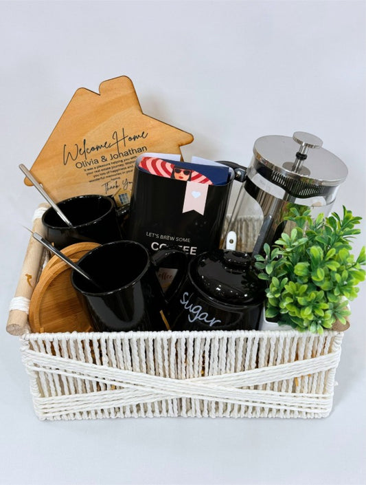Kintoir luxury French press coffee gift basket featuring mugs, silver spoons, sugar jar, and a custom wooden house sign.