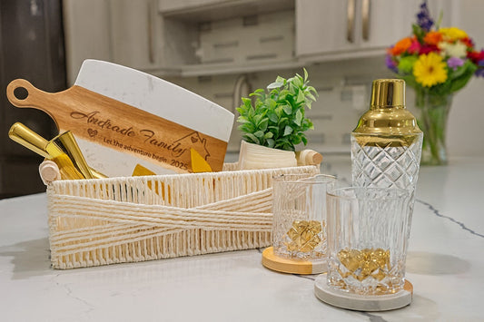Golden Hour Entertainer personalized gold cocktail gift basket with engraved cutting board, gold barware, glasses, and home accents | Kintoir
