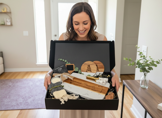 Made to Impress personalized client gift box with engraved cutting board, coasters, keychains and home accents