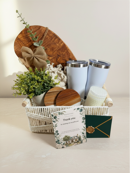 Luxury Realtor closing gift basket with olive wood serving board, two tumblers, candle and greenery by Kintoir