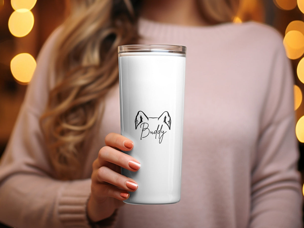 Kintoir personalized white tumbler featuring a custom dog ear outline and pet name engraving held by a woman