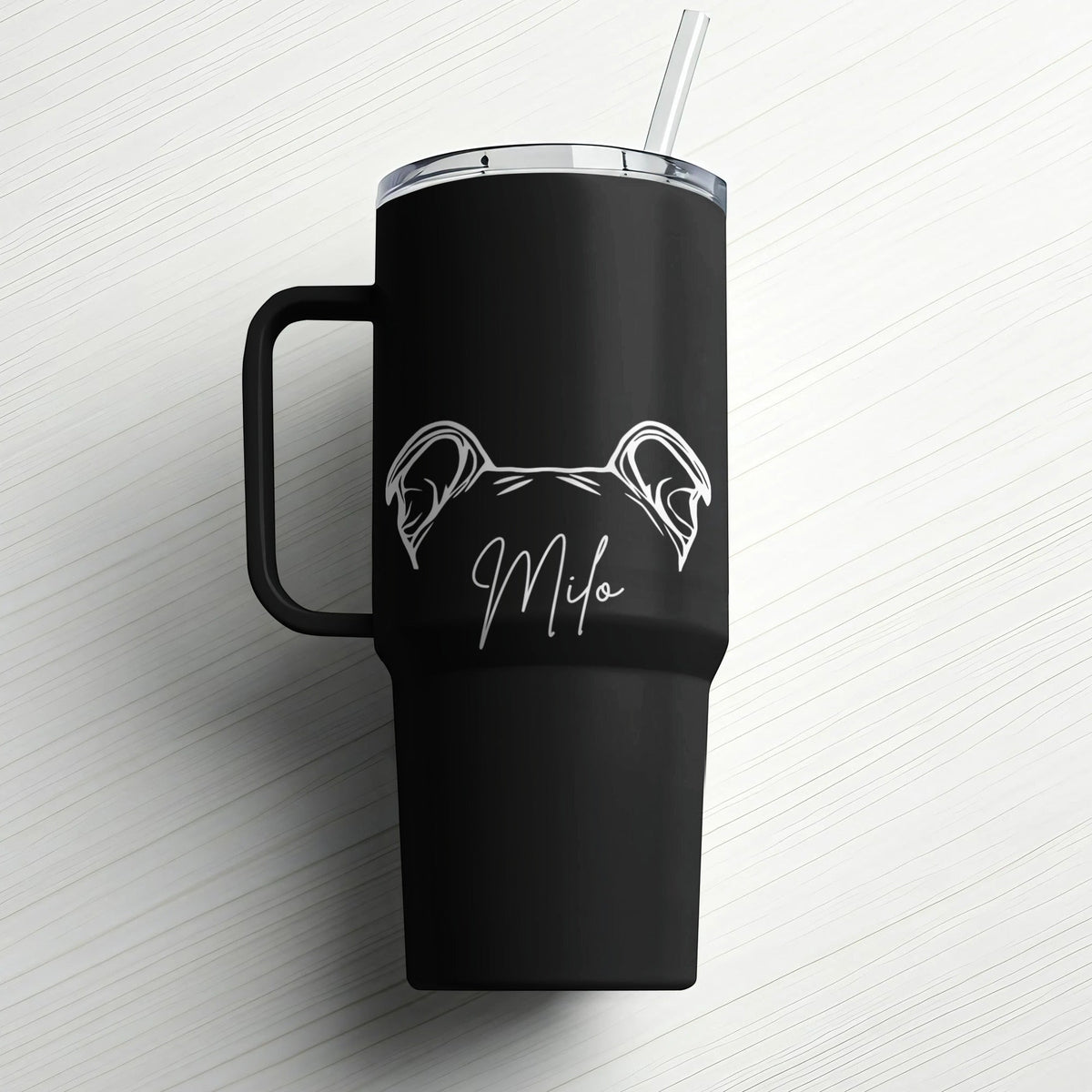 Kintoir personalized black stainless steel tumbler featuring a white engraved dog ear outline and custom pet name