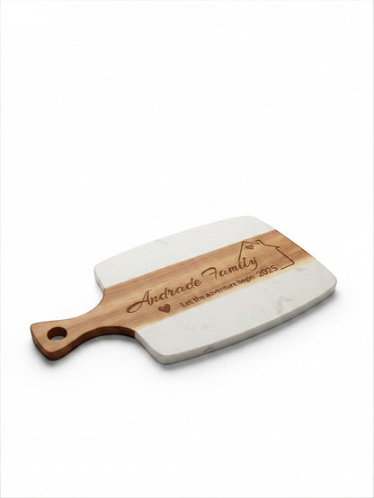 Kintoir personalized marble and wood cutting board with laser-engraved family name and housewarming design